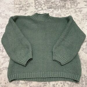 Dark green sweater